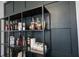 Stylish shelves featuring glassware and decor in a modern dining space at 6047 Guilford Ave, Indianapolis, IN 46220
