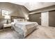 Cozy main bedroom with a decorative headboard, plush carpet, and neutral decor at 6432 Hunters Green Ct, Indianapolis, IN 46278