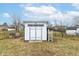 Backyard shed with ample storage space and an access ramp at 7344 Quartz Rock Rd, Indianapolis, IN 46236