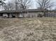 Ranch-style home with gray siding, a covered porch, and a walkway leading to the front door at 7643 S Delaware St, Indianapolis, IN 46227