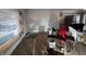 Living room with large window; room is prepped and undergoing renovations at 7643 S Delaware St, Indianapolis, IN 46227