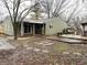 This home has a backyard with a large deck, a hammock, and stone walkways, all great for entertaining at 7824 Inverness Dr, Indianapolis, IN 46237