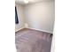Cozy carpeted bedroom with neutral walls and a ceiling fan at 7824 Inverness Dr, Indianapolis, IN 46237