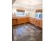 Spacious dining room offering custom cabinetry and built-in wine storage at 7824 Inverness Dr, Indianapolis, IN 46237