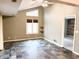 Living room with vaulted ceilings, clerestory window, and decorative tile flooring at 7824 Inverness Dr, Indianapolis, IN 46237