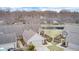 Aerial view of a home with a two-car garage and brick-lined front yard at 8545 Olde Ml Trce, Indianapolis, IN 46260