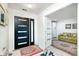 Bright entryway featuring modern front door and access to the living area at 8545 Olde Ml Trce, Indianapolis, IN 46260