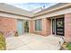 Home exterior featuring brick facade, and modern black door at 8545 Olde Ml Trce, Indianapolis, IN 46260