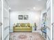 Cozy living area featuring a comfortable couch and stylish decor at 8545 Olde Ml Trce, Indianapolis, IN 46260