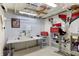 Basement workshop with a work bench, pegboard, and storage for all your hobby needs at 908 Whispering Trl, Greenfield, IN 46140