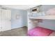 Bedroom with bunk beds, light blue walls, and plush neutral carpeting at 908 Whispering Trl, Greenfield, IN 46140