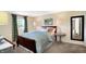 Serene bedroom with a calming color scheme and luxurious bedding at 908 Whispering Trl, Greenfield, IN 46140