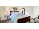 Bedroom features a bed, side tables, and a mirrored closet providing ample storage at 908 Whispering Trl, Greenfield, IN 46140