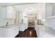 Bright and spacious kitchen features white cabinets and modern appliances at 908 Whispering Trl, Greenfield, IN 46140
