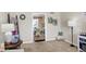 Bright living room with a view into the dining room and stylish decor at 908 Whispering Trl, Greenfield, IN 46140