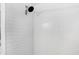 Shower stall with white tile and updated shower head at 908 Whispering Trl, Greenfield, IN 46140