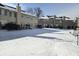 Wide backyard view with a blanket of snow highlighting the outdoor space available in this residential community at 1017 Grovewood Dr, Beech Grove, IN 46107