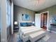 Beautiful bedroom featuring carpet, large window, a queen-sized bed and decor at 10297 Anees Ln, Fishers, IN 46040