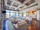 Beautifully furnished living room with seamless connection to the bright kitchen at 10297 Anees Ln, Fishers, IN 46040