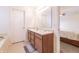 Double vanity bathroom offers generous counter space and a separate shower area at 11005 Long Lake Ln, Fishers, IN 46037