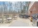 Outdoor deck with dining set, seating and a grill for entertaining friends and Gathering at 11727 Windpointe Pass, Carmel, IN 46033
