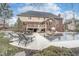 Beautiful backyard with a pool, patio, and lush landscaping, perfect for outdoor enjoyment at 11727 Windpointe Pass, Carmel, IN 46033