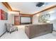A media room with a large screen, plush seating, and custom millwork at 11727 Windpointe Pass, Carmel, IN 46033