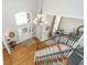 Grand foyer showcasing a staircase, chandelier, and a large window illuminating the space at 11727 Windpointe Pass, Carmel, IN 46033