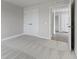 Bedroom with soft carpet, neutral walls, and white trim, leading to the rest of the home at 1202 Brightwood Cir, Greenfield, IN 46140