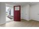 Beautiful foyer featuring neutral paint, light wood floors and a glimpse of the exterior at 1202 Brightwood Cir, Greenfield, IN 46140
