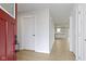 Bright foyer with neutral walls and floors, with a view to the kitchen in the distance at 1202 Brightwood Cir, Greenfield, IN 46140