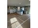 Bright kitchen with ample counter space, an island, and modern white cabinetry at 1202 Brightwood Cir, Greenfield, IN 46140
