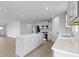 Open kitchen layout with a large island, stainless steel appliances, and ample counter space for meal preparation at 1202 Brightwood Cir, Greenfield, IN 46140