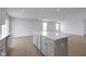 Spacious kitchen featuring a large island, stainless steel appliances, recessed lighting, and an open concept design at 1202 Brightwood Cir, Greenfield, IN 46140