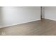 Bright living room featuring neutral walls, white trim, and contemporary flooring for a clean, modern look at 1202 Brightwood Cir, Greenfield, IN 46140