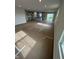 Expansive living area seamlessly connects to the bright, modern kitchen at 1202 Brightwood Cir, Greenfield, IN 46140