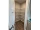 Walk-in pantry with ample shelving, offering great storage at 1202 Brightwood Cir, Greenfield, IN 46140
