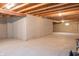 Unfinished basement with concrete walls and exposed beams offers potential for customization at 14461 Brook Meadow Dr, McCordsville, IN 46055