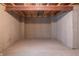 Unfinished basement featuring concrete walls and floors, with exposed ceiling joists and utility access at 14461 Brook Meadow Dr, McCordsville, IN 46055