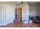 Hardwood flooring graces this living room, complete with a built-in cabinet and bright white trim at 14461 Brook Meadow Dr, McCordsville, IN 46055