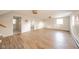 Basement with wood floors, neutral walls, and multiple doors and windows at 1718 Charles St, Anderson, IN 46013