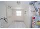 Finished basement with white walls and a window and view of the water heater at 1718 Charles St, Anderson, IN 46013