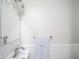 Bright bathroom with a vanity, a large mirror, and a patterned gray and white hand towel at 1718 Charles St, Anderson, IN 46013