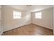 Bright bedroom with wood-look flooring and a neutral color palette at 1718 Charles St, Anderson, IN 46013