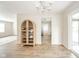 Bright living area featuring wood floors, neutral walls, and an open layout at 1718 Charles St, Anderson, IN 46013