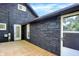 Spacious back deck with stone exterior at 1933 Koehne St, Indianapolis, IN 46202