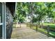 Backyard view of the wooden deck and fenced yard at 1933 Koehne St, Indianapolis, IN 46202