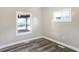 Bright room with vinyl floors and neutral color scheme, creating a welcoming and modern space at 1933 Koehne St, Indianapolis, IN 46202