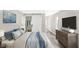 Comfortable main bedroom with elegant decor, soft lighting, and ample space at 1933 Koehne St, Indianapolis, IN 46202