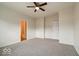 Spacious bedroom featuring neutral walls, plush carpet, and a ceiling fan for comfortable living at 2452 Bristol Dr, Franklin, IN 46131